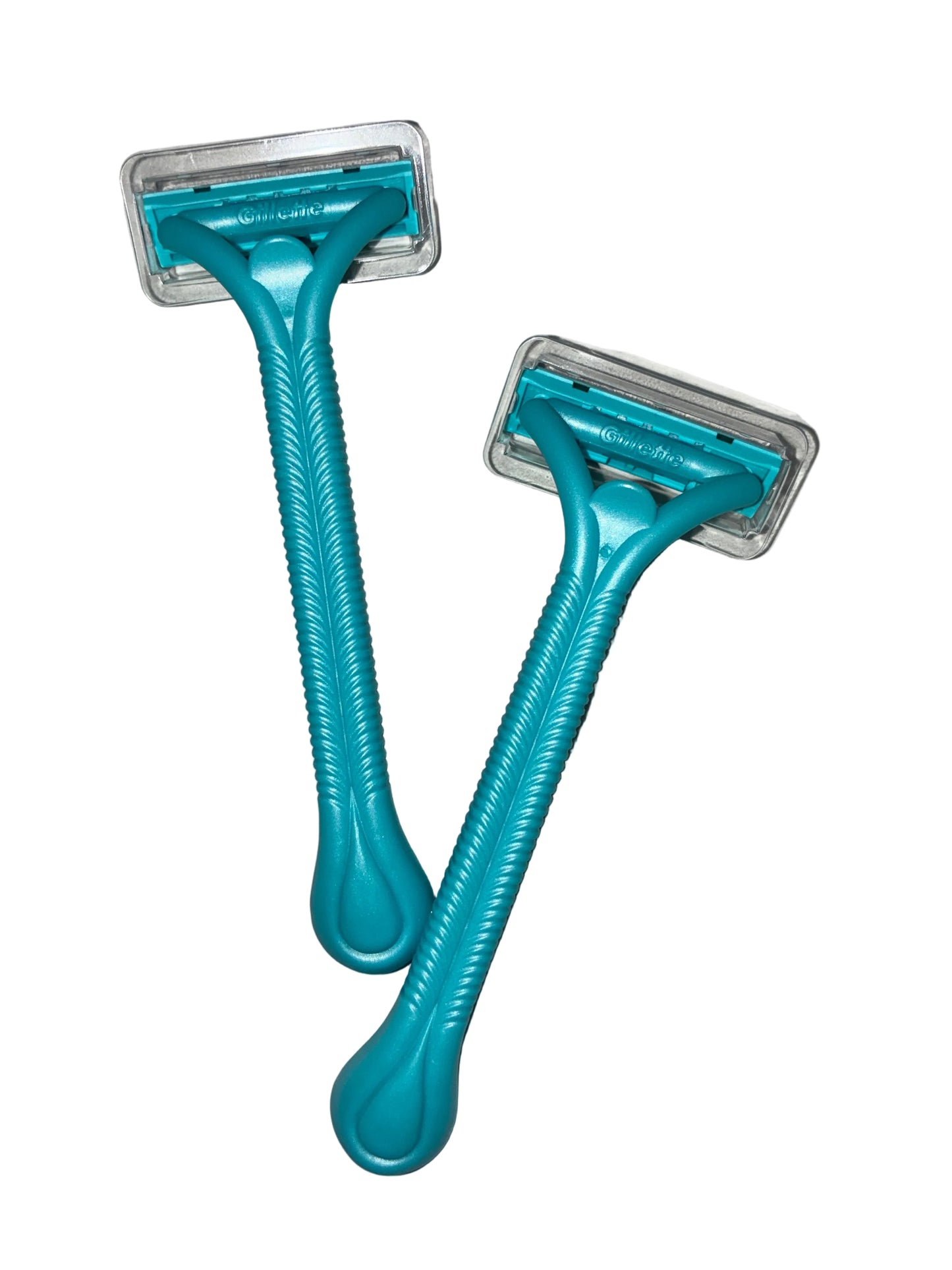 Two turquoise razors with silver tops on a white background
