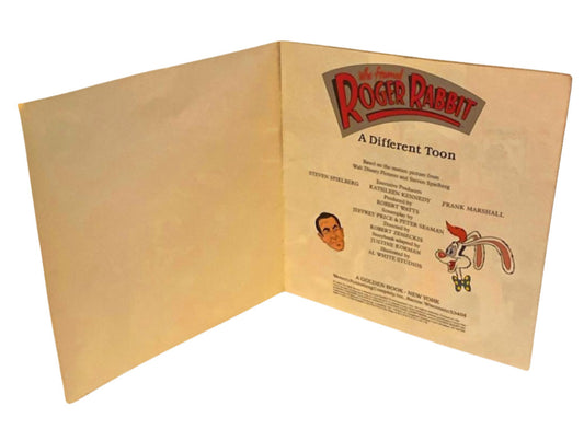 Cardboard folder with 'A Different Toon' text and cartoon characters on a white background