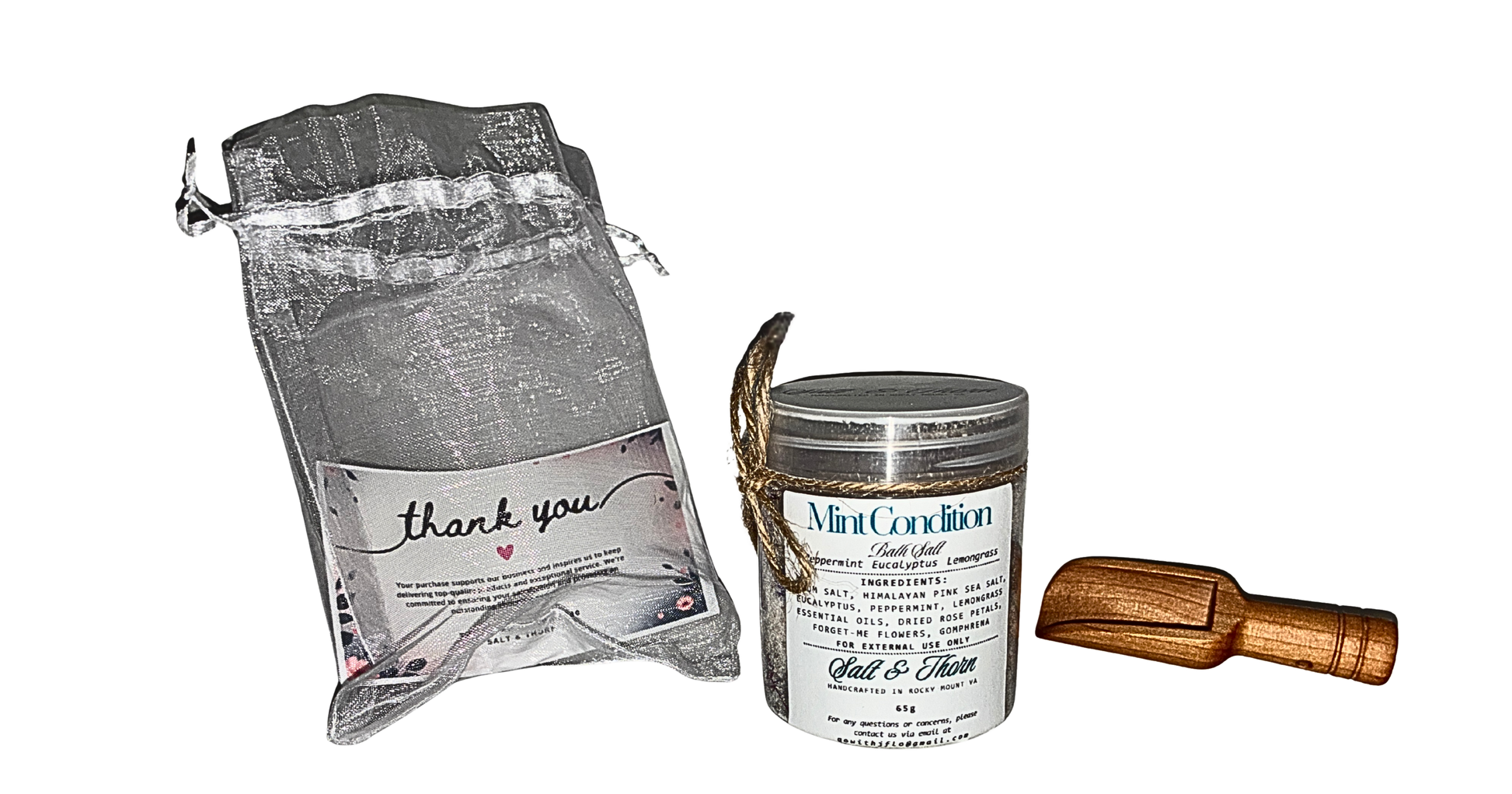 Product packaging with a drawstring bag, a tin labeled 'Mint Condition', and a wooden tool on a white background.