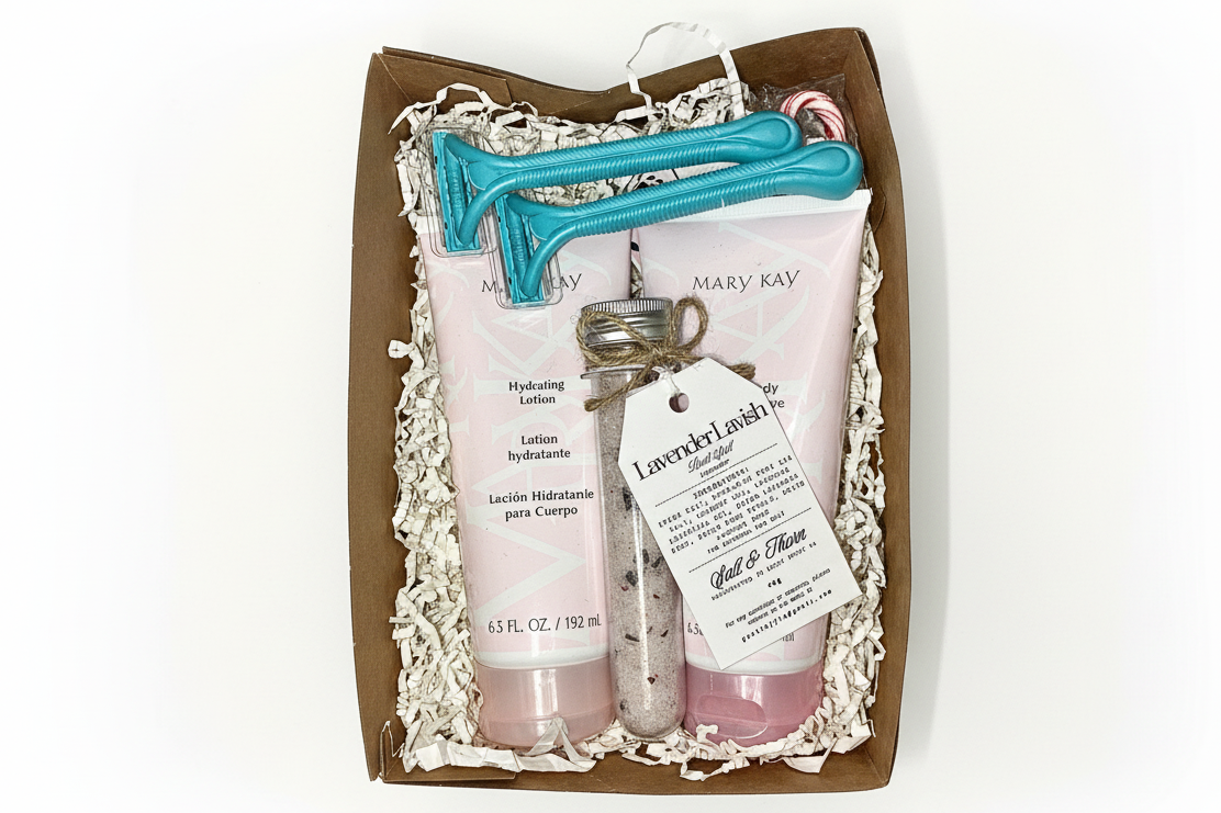 Mary Kay product set with two lotion bottles and a bath salt in a decorative box.