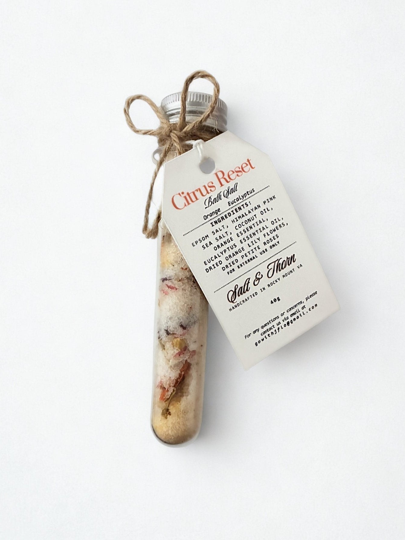 Bottle of 'Citrus Reset' with a label on a white background