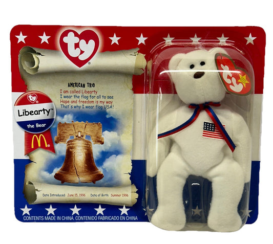 Plush bear toy in packaging with McDonald's branding and American flag elements.